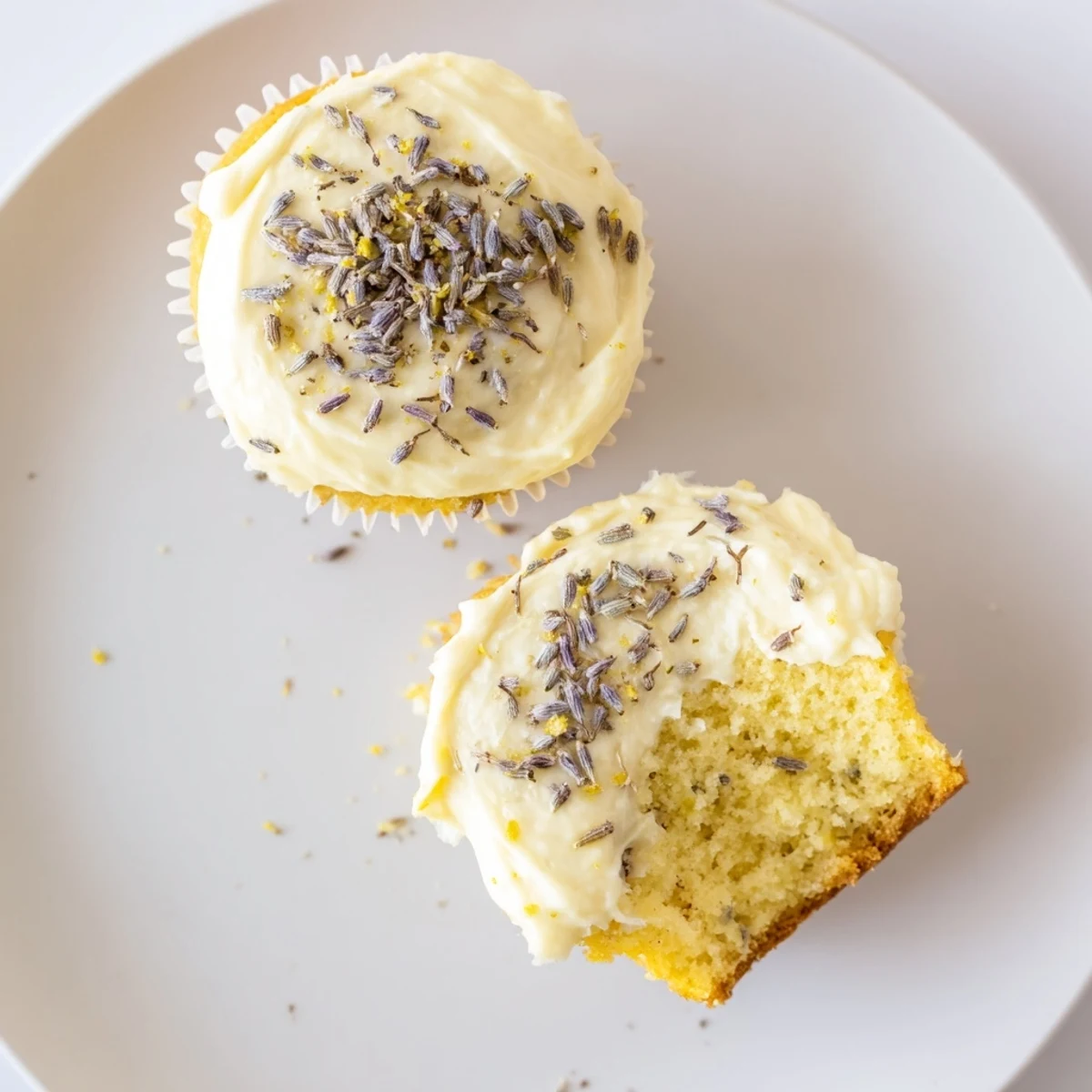 Fluffy citrus cupcakes infused with culinary lavender buds and swirls of tangy lemon buttercream