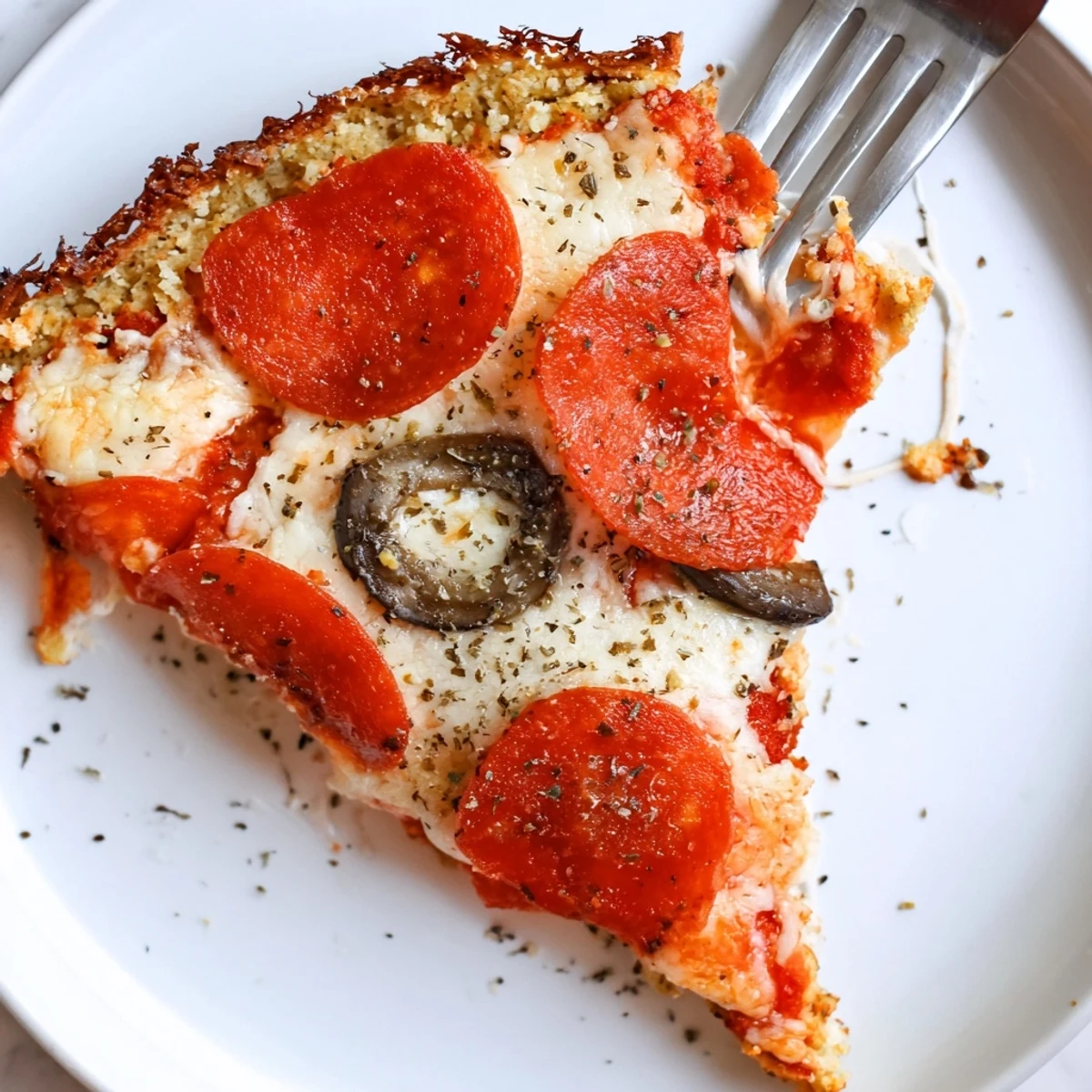 Keto Pizza With Crispy Low Carb Crust bubbling with golden cheese and pepperoni