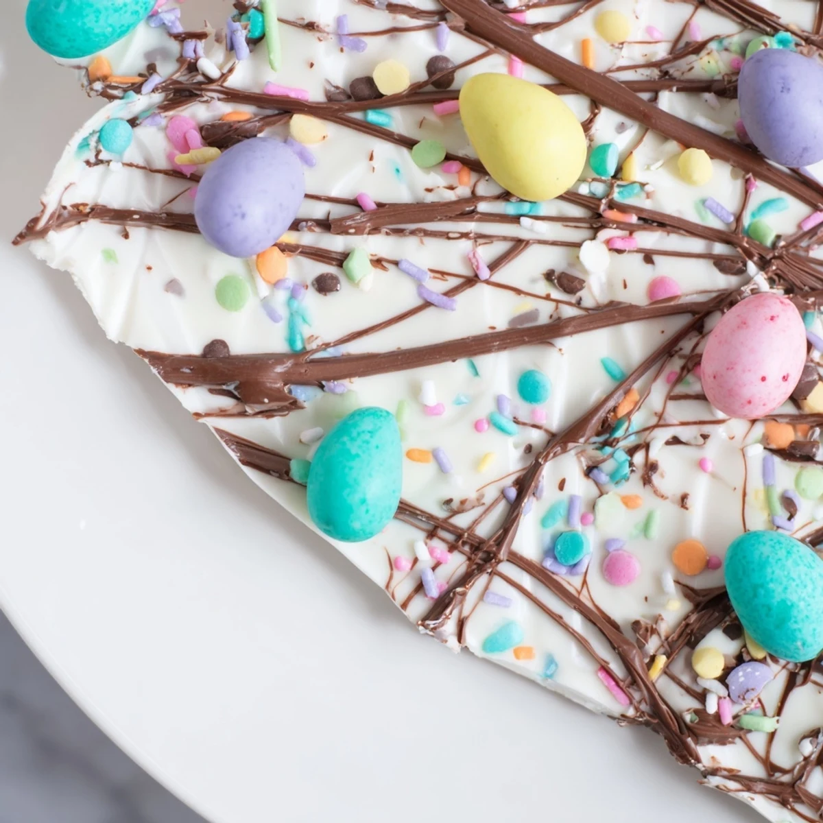 Sliced Robin Egg Easter Bark served on plate, sweet, creamy, crunchy bites.